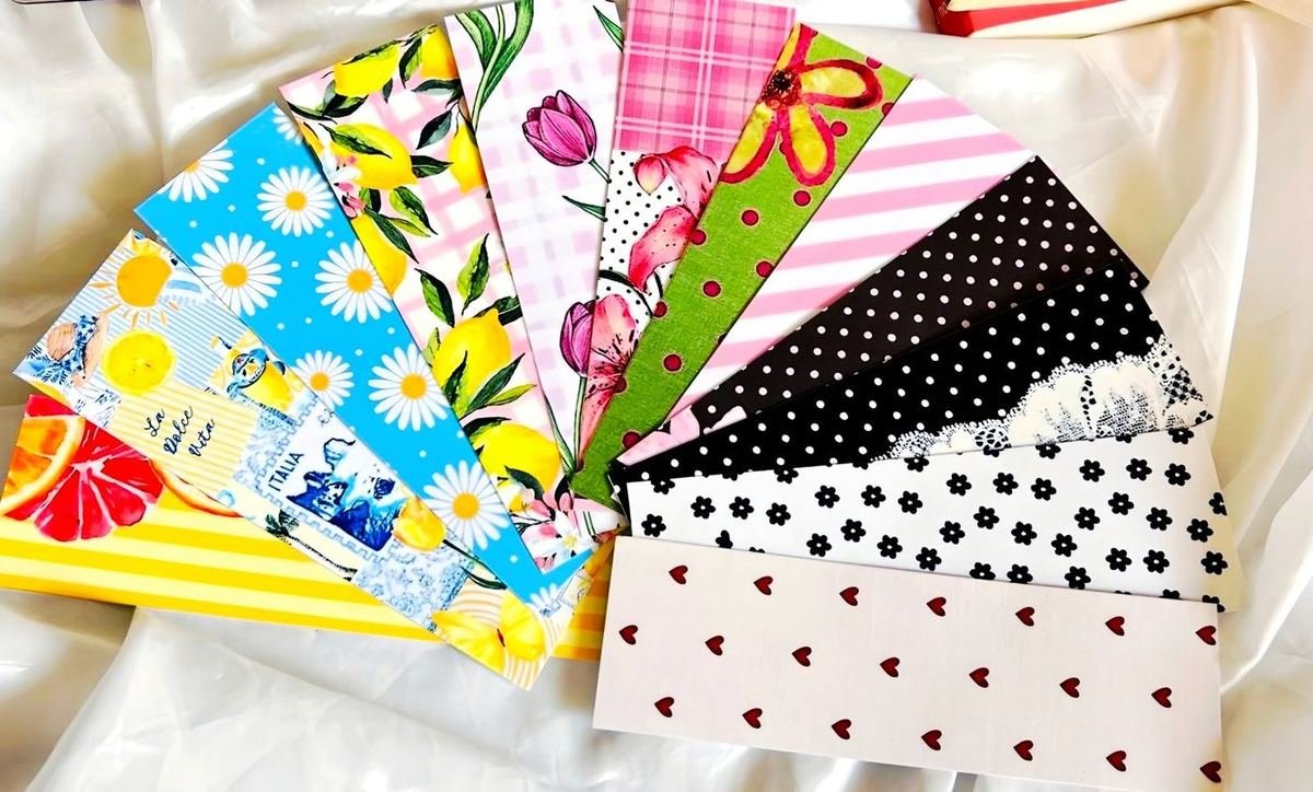 Fan of colourful custom-printed bookmarks in floral, fruit and quote designs