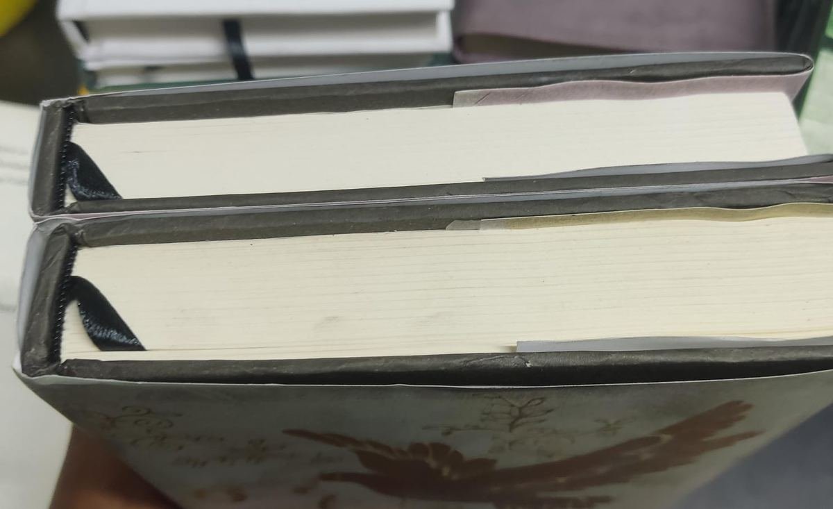 Hardcover book with dust jacket on a shelf