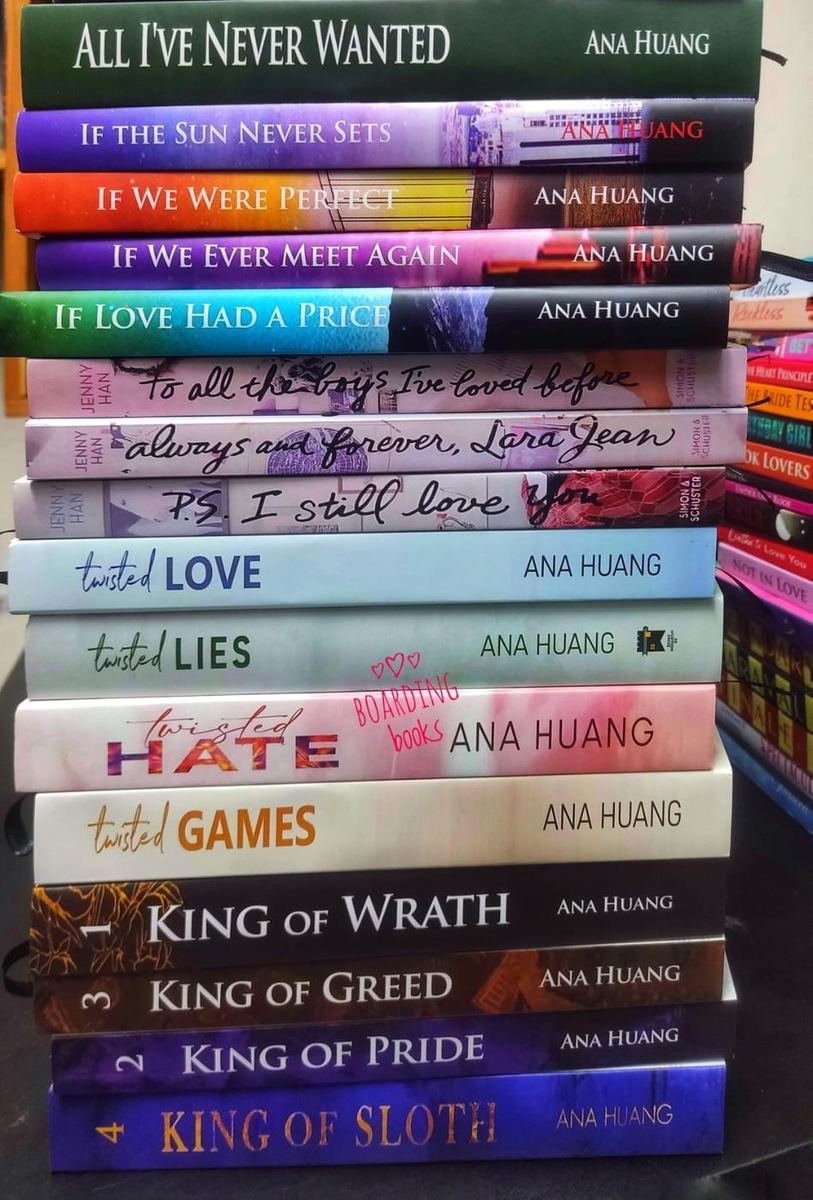 Stack of hardcover books showing sturdy boards, sewn spines and ribbon markers